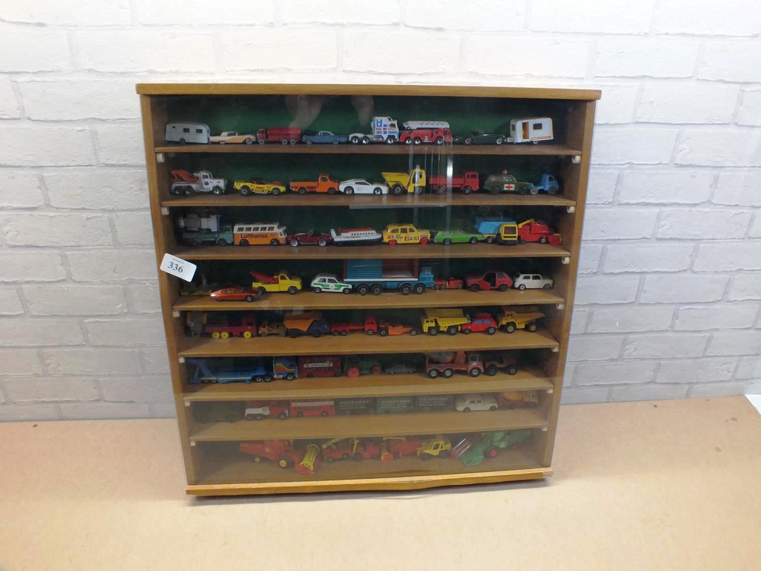 DISPLAY CASE OF 60 PLUS VINTAGE MATCHBOX/LESNEY CARS/VEHICLES