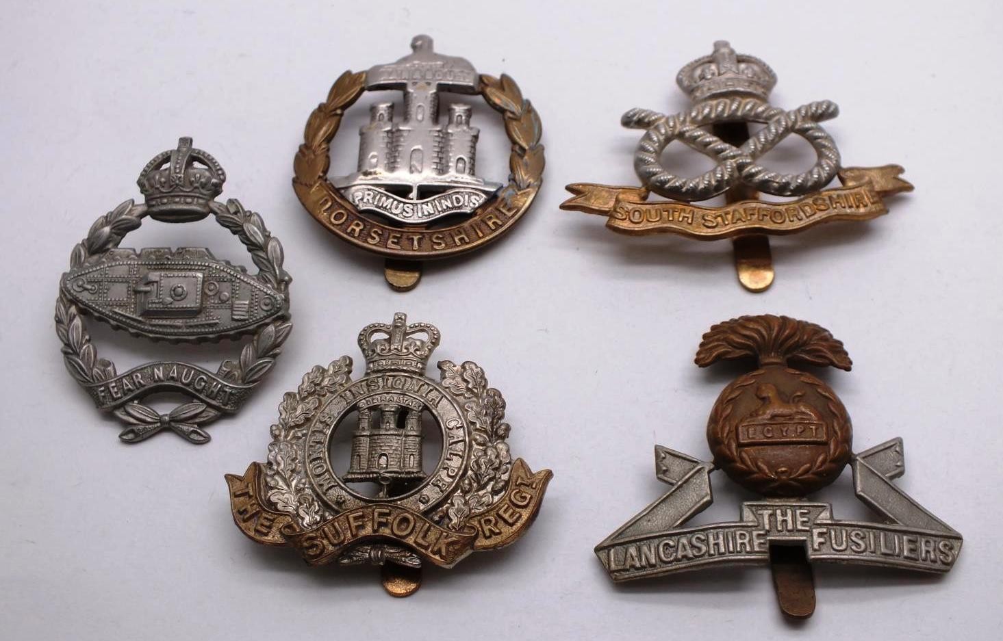 FIVE MILITARY CAP BADGES