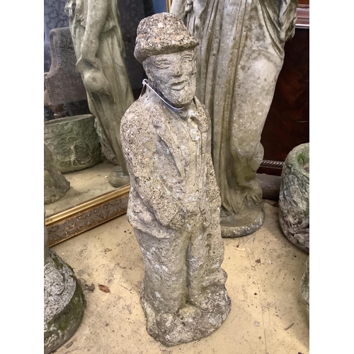 1006 - A reconstituted stone garden ornament of a standing figure, height 57cm
