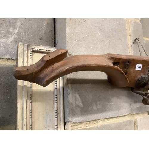 1037 - A 19th century iron mounted ox yoke, length 110cm