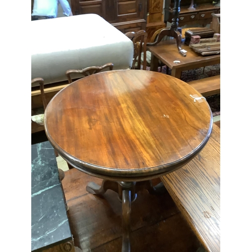 1052 - A circular mahogany occasional table on tripod base, diameter 60cm, height 70cm together with a rect... 