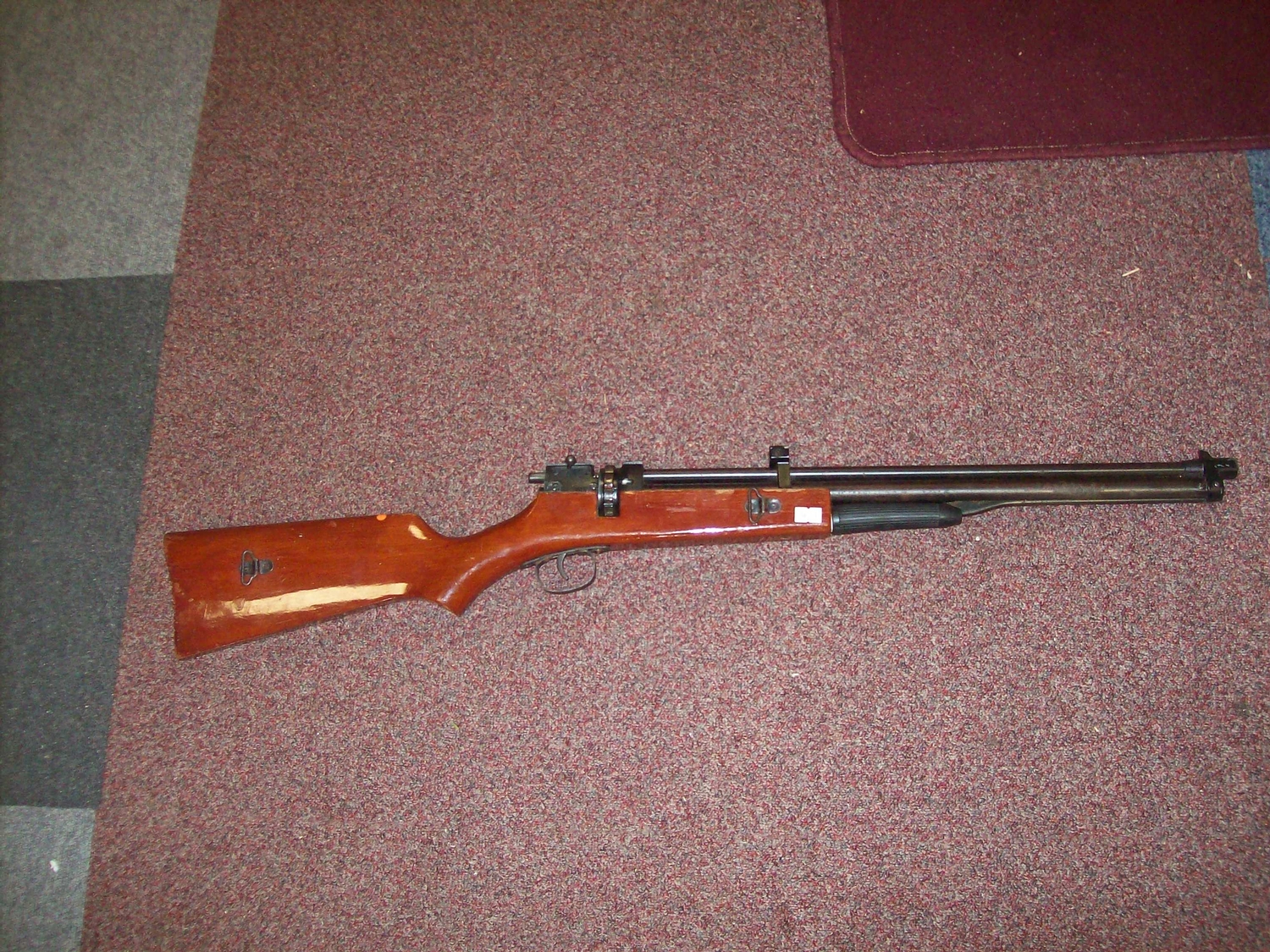 A Bolt Action 177 Pump Air Rifle And 12 Shot Magazine