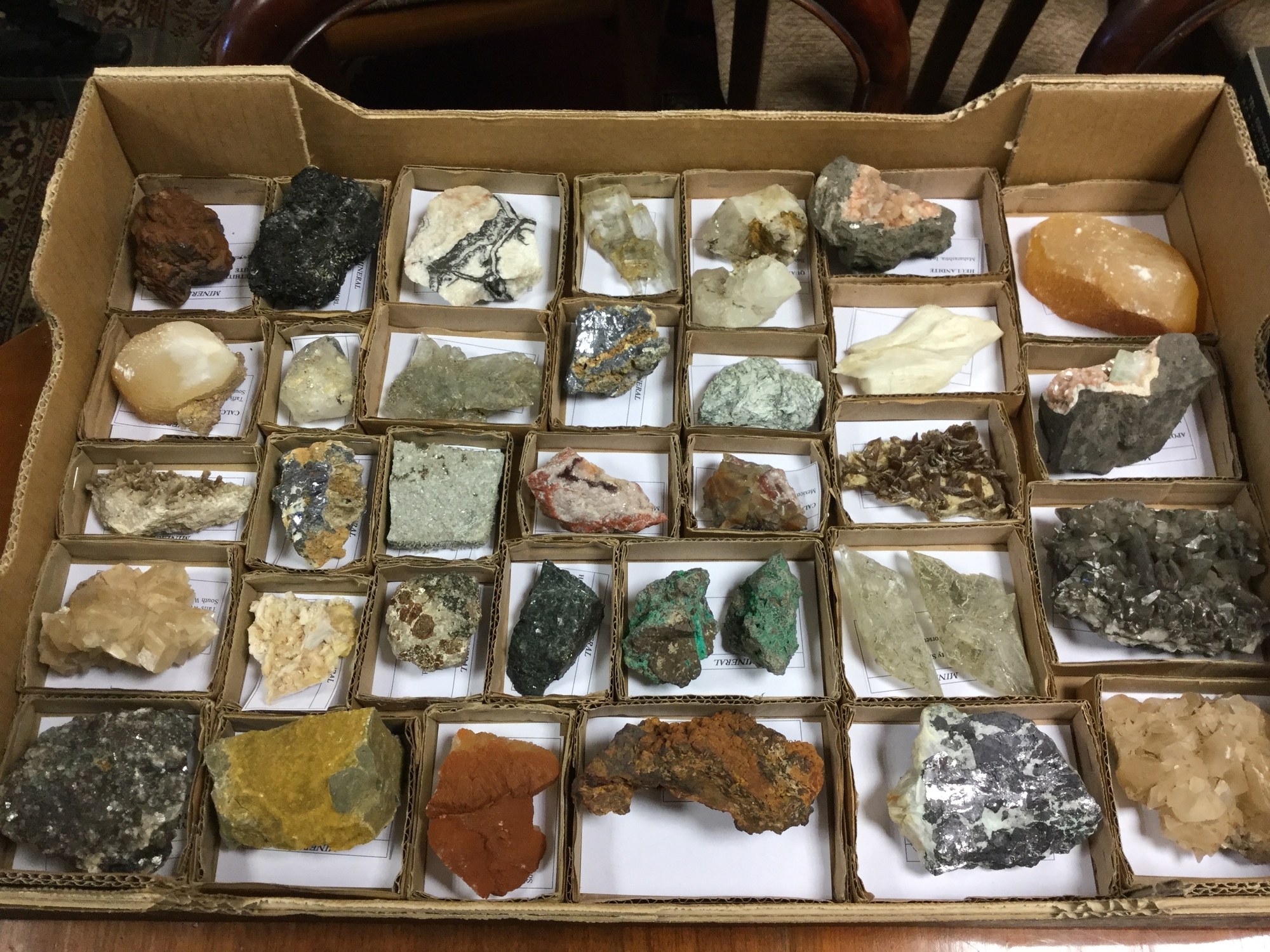 A collection of labelled predominantly British mineral specimens