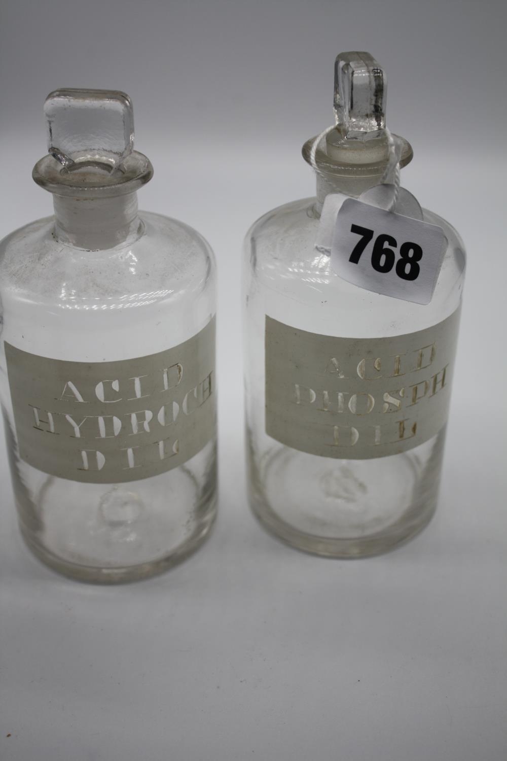 2 acid bottles 6" h.