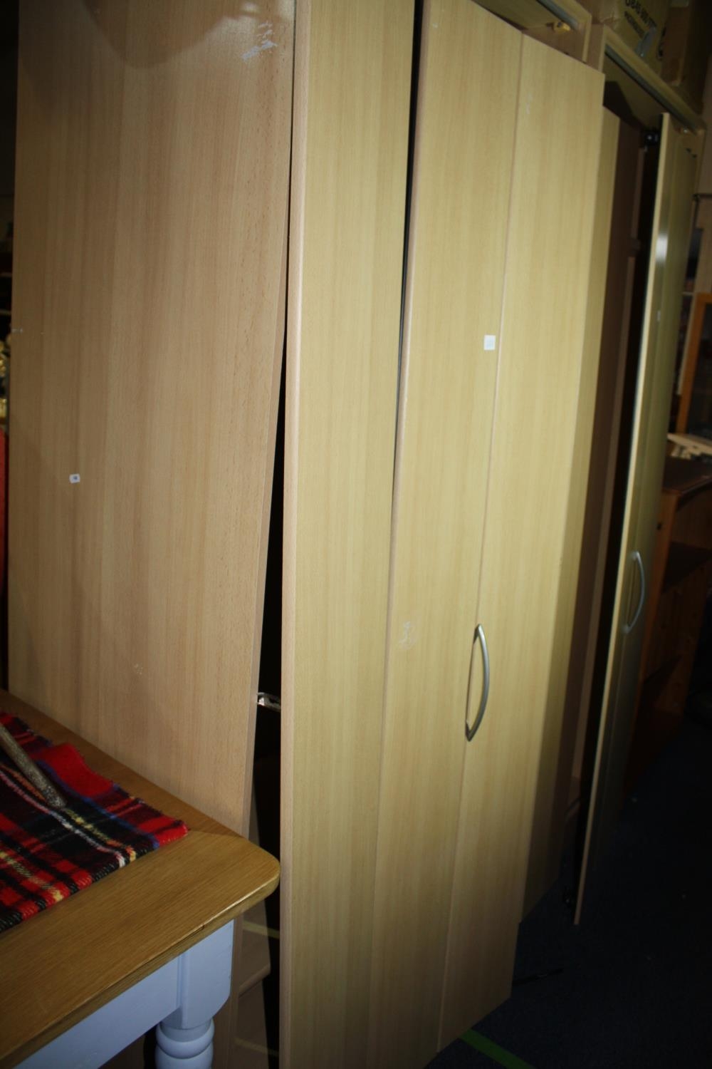 Concertina door 2 door wardrobe 78" h. x 30 1/2" w.