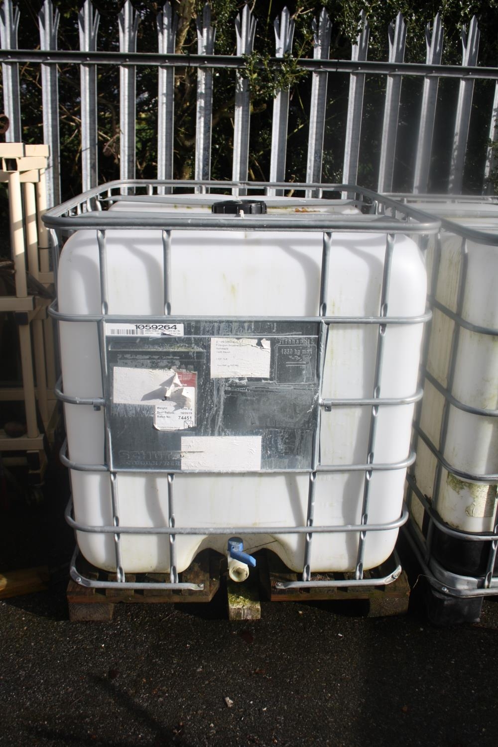 Galvanised caged water tank