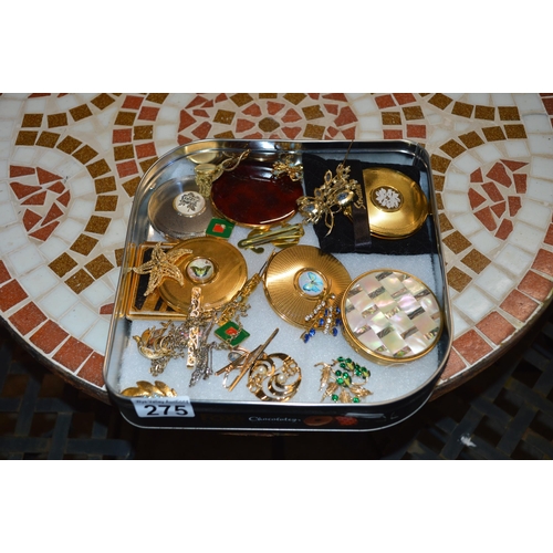 Box of mixed brooches and compacts