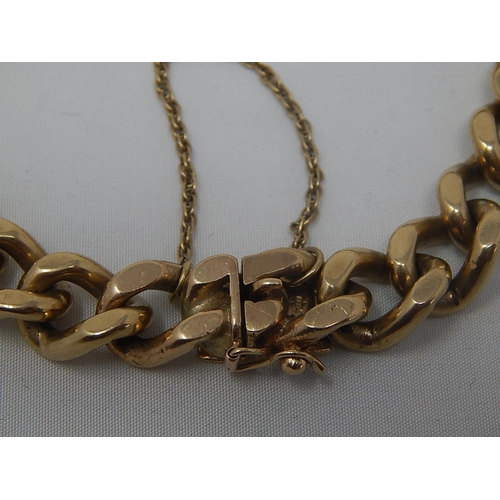335 - Heavy 9ct Gold Bracelet with Safety Chain: Weight 63.6g