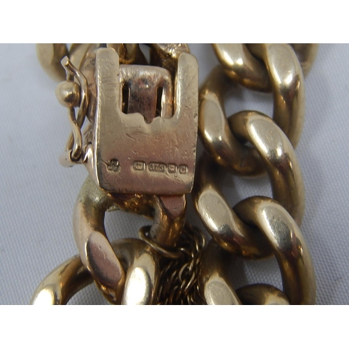 335 - Heavy 9ct Gold Bracelet with Safety Chain: Weight 63.6g