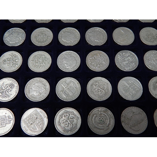 Collectors steel coin case with fitted trays containing a collection of ...