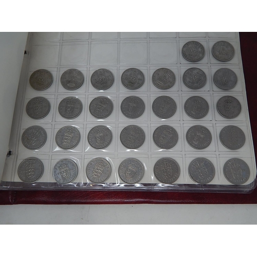 29 - A substantial collection of mainly British coinage housed in collectors album and 5 x vintage Whitma... 