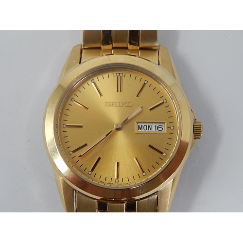 23 - Gentleman's Seiko Wristwatch with Day/Date Apertures.