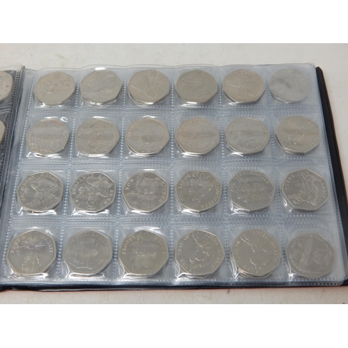 Professional Coin Collection Book containing a complete set of Olympic