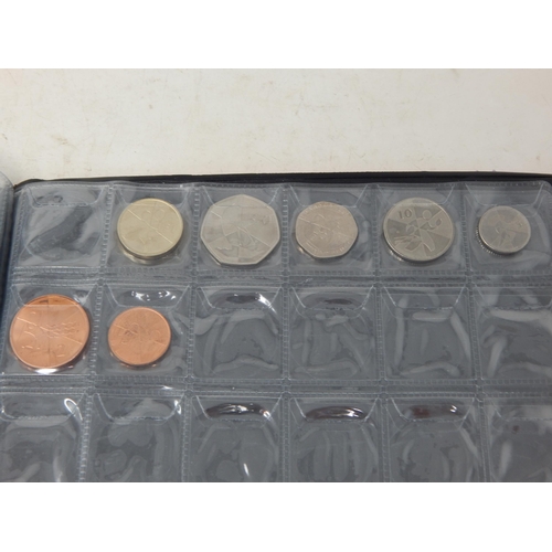 Professional Coin Collection Book containing a complete set of Olympic