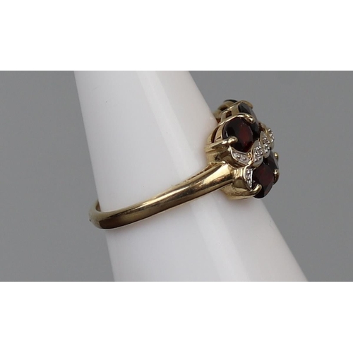 38 - Gold garnet & diamond set ring - Size M½