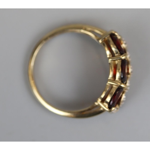 38 - Gold garnet & diamond set ring - Size M½