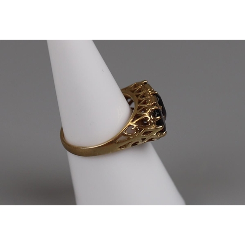 31 - Gold 3 stone garnet ring - Size N