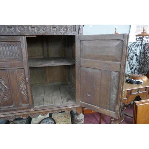 310 - Early carved oak livery cupboard - Approx. size W:129cm D:68cm H:165cm