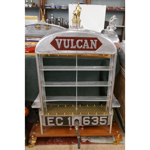 Vulcan radiator grill shelf display with Vulcan mascot rad cap