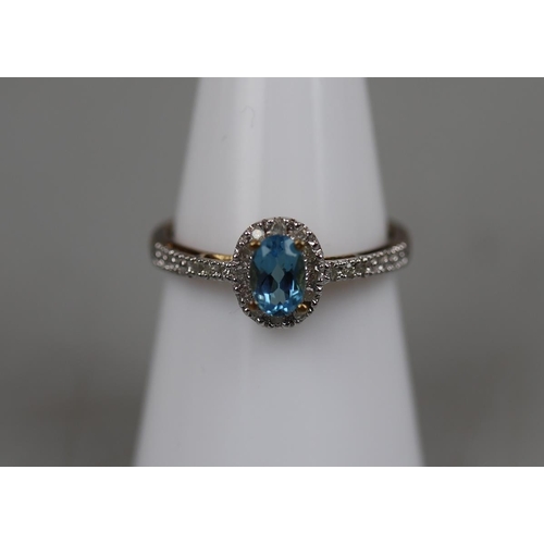 41 - Gold blue topaz & diamond ring - Approx. size: P