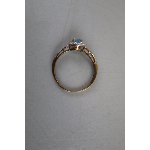 41 - Gold blue topaz & diamond ring - Approx. size: P