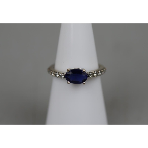 44 - 18ct white gold sapphire and diamond ring - Approx. size: K