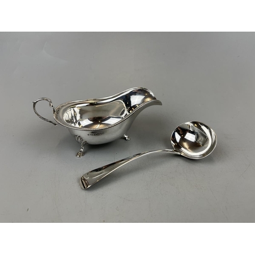 7 - Hallmarked silver sauce boat and ladle - Approx. weight 149g
