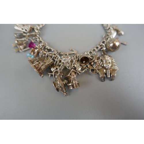 30 - Silver charm bracelet