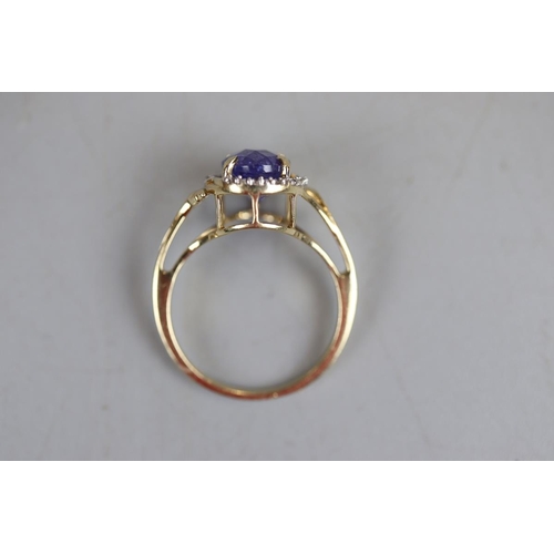 43 - Gold tanzanite & diamond ring - Approx size: Q