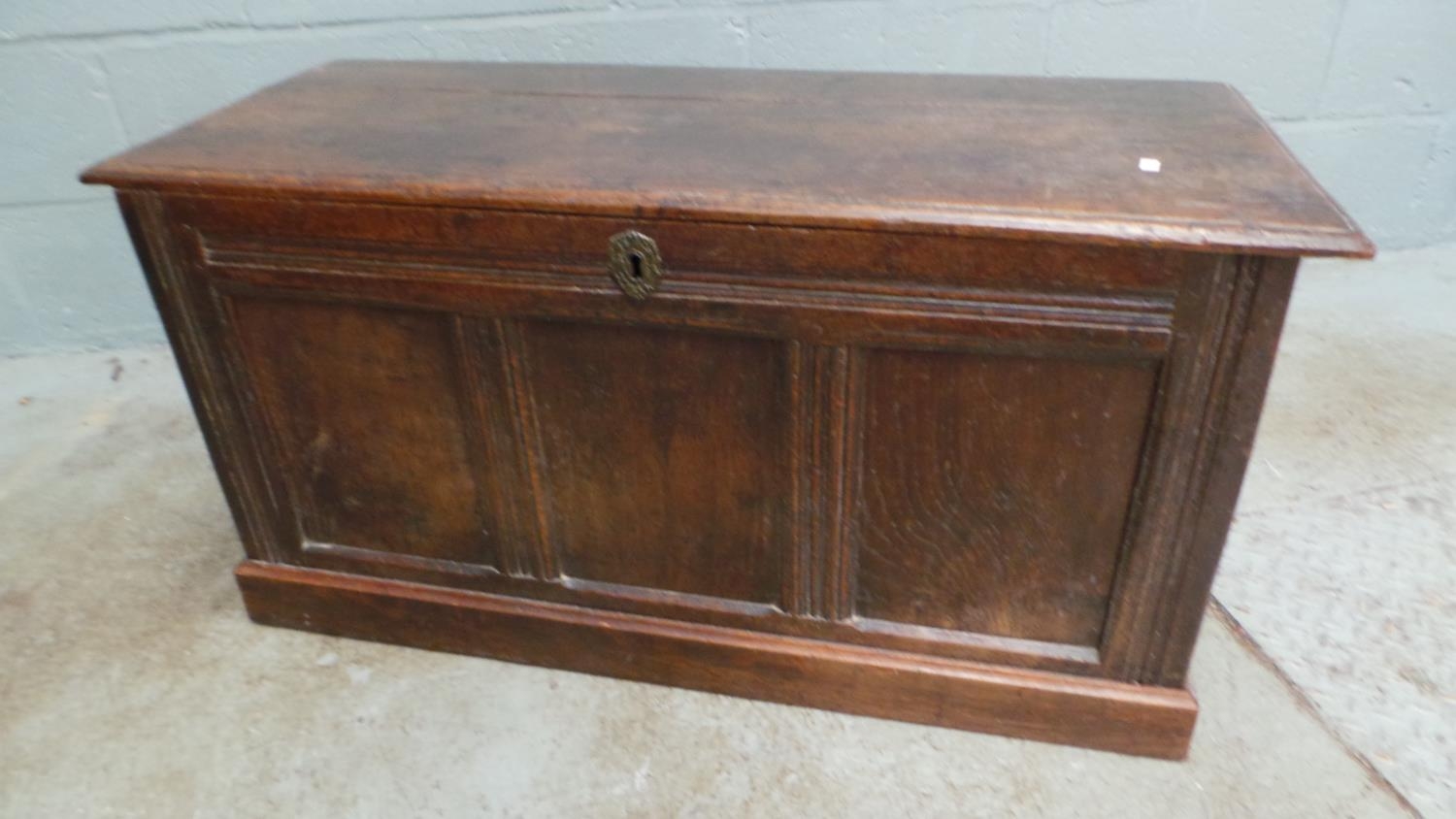 An antique oak blanket box measuring approx' 98W x 40D x 49cmH