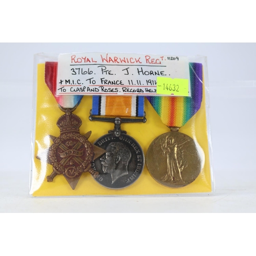 61 - A WW1 medal trio awarded to 3766 Pte. J. Horne (entitled to clasp and roses, M.I.C to France 11.11.1... 