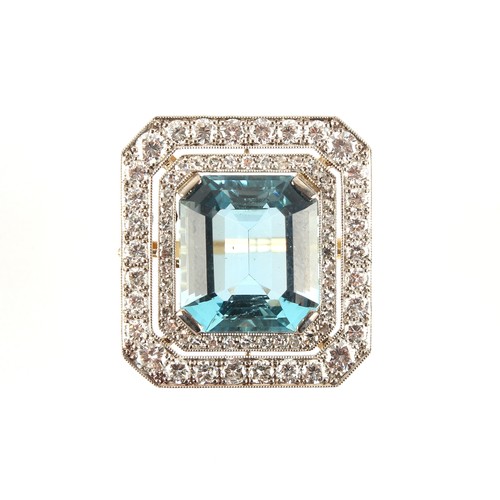 11 - A good aquamarine & diamond ring, the large octagonal cut aquamarine of excellent colour and weighin... 