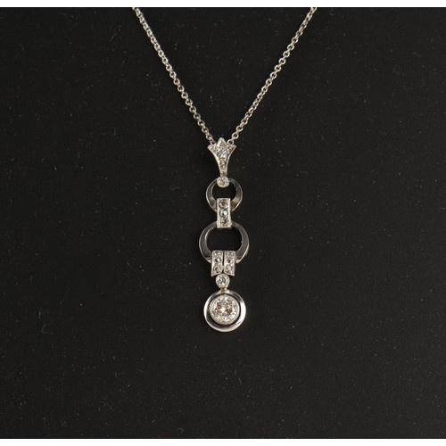 29 - A white gold diamond articulated pendant on 14ct white gold chain necklace, the largest round brilli... 
