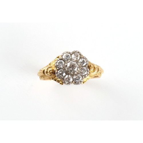 43 - An unmarked 19th century yellow gold diamond cluster ring, with nine old cut diamonds between chased... 