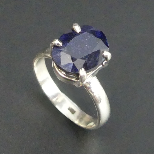 32 - Oval blue sapphire Sterling silver ring, 5.5 grams. Size T, 12.8 mm top. UK Postage £12.