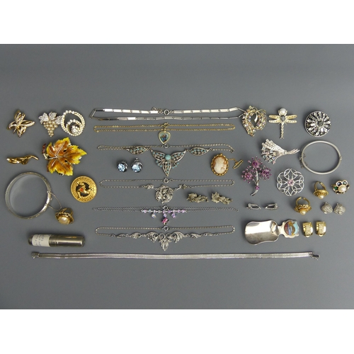46 - A collection of costume and silver jewellery, including two silver hinged bangles, Monet and other s... 
