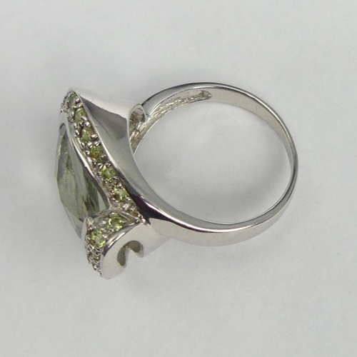 10 - Two Sterling silver cocktail rings, 17.7 grams. Size P & S. UK Postage £12.