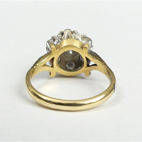 11 - 18 carat gold Diamond cluster ring, 5.6 grams. Size N, 12.3 mm wide. UK Postage £12.