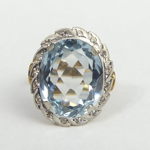18a - 18 carat gold blue and white stone set dress ring, 5.7 grams. Size O, 22 mm wide. UK Postage £12.