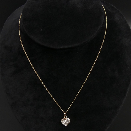22 - 9 carat gold Diamond pendant and chain, 2.3 grams. Pendant 17 x 10 mm, chain 50 cm. UK Postage £12.
