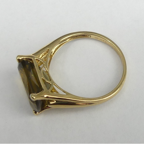 8 - 9 carat gold Citrine? single stone ring, 3.6 grams. Size S, 10 mm wide. UK Postage £12.