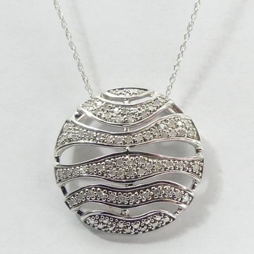 9 - 9 carat white gold Diamond pendant and chain, 3.5 grams. 20 mm pendant. 45 cm chain. UK Postage £12.