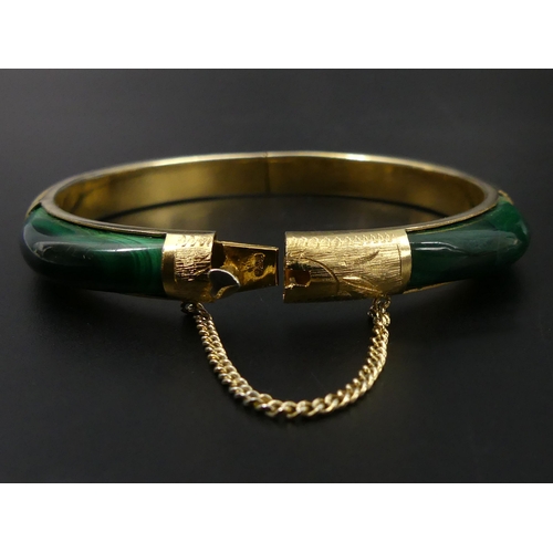 27 - Sterling silver vermeil and Malachite hinged bangle, 25.5 grams. 8 mm wide. UK Postage £12.