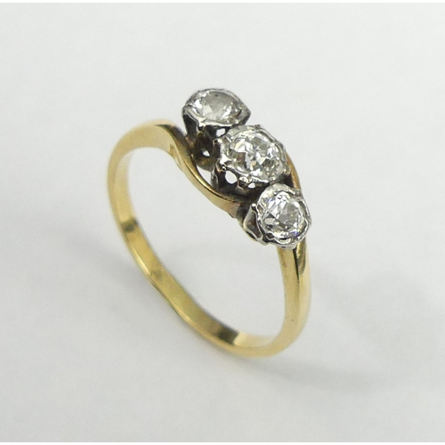 42 - 18 carat gold three stone diamond trilogy ring, 2.5 grams.Size K. UK Postage £12.
