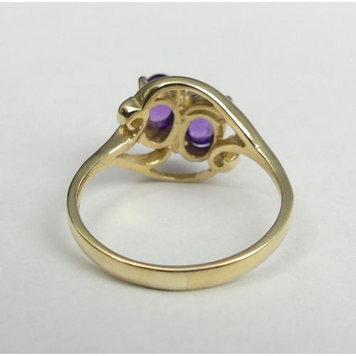 43 - 9 carat gold Amethyst two stone ring, 2.5 grams, Sheffield 1994. Size K 1/2, 11 mm wide. UK Postage ... 
