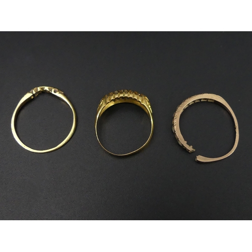 52 - Two 18 carat gold diamond rings (3.7 grams) and a 9 carat c.z set ring (1.3 grams). UK Postage £12.