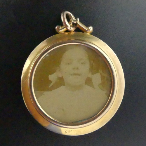 12 - Edwardian 9 carat gold picture locket pendant, 6.1 grams. 34 mm x 42 mm. UK Postage £12.