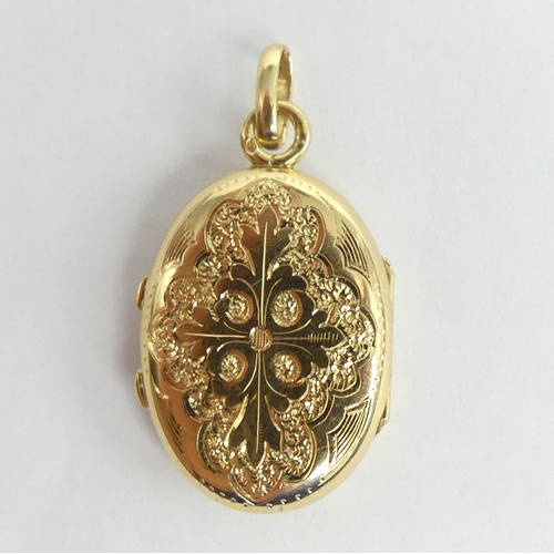 14 - 18ct gold enamel, seed pearl and ruby locket pendant, 6.2 grams. 36 mm x 19 mm. UK Postage £12.