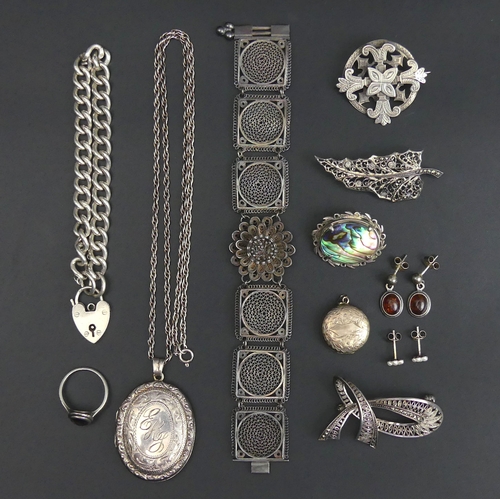 15 - Various items of silver jewellery, including a locket pendant and chain, a filigree bracelet and a c... 