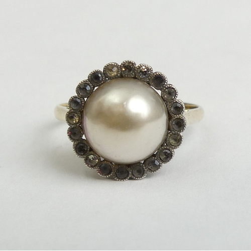 20 - 18ct gold Mabe pearl and stone set ring, 3.2 grams. Size O 1/2, 13.8 mm wide. UK Postage £12.